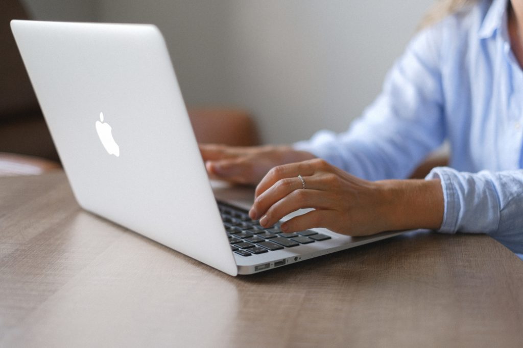 employee typing | Infinity Group